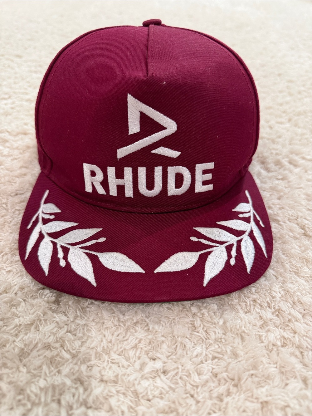 Rhude Maroon Snapback Hat with White Embroidered Leaf Motif